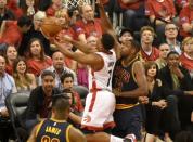 May 21, 2016; Toronto, Ontario, CAN; Toronto Raptors guard Kyle Lowry (7) shoots for a basket past Cleveland Cavaliers forward Tristan Thompson (13) in game three of the Eastern conference finals of the NBA Playoffs at Air Canada Centre. Mandatory Credit: Dan Hamilton-USA TODAY Sports