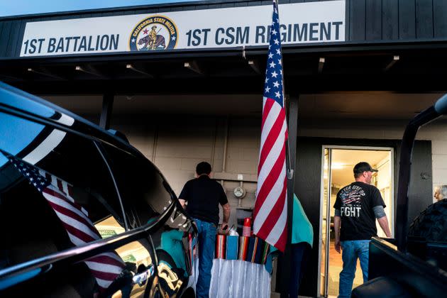 Members of the First Battalion of the 1st California Militia prepare for an emergency medical training class in Cottonwood, California, on Feb. 11, 2022.