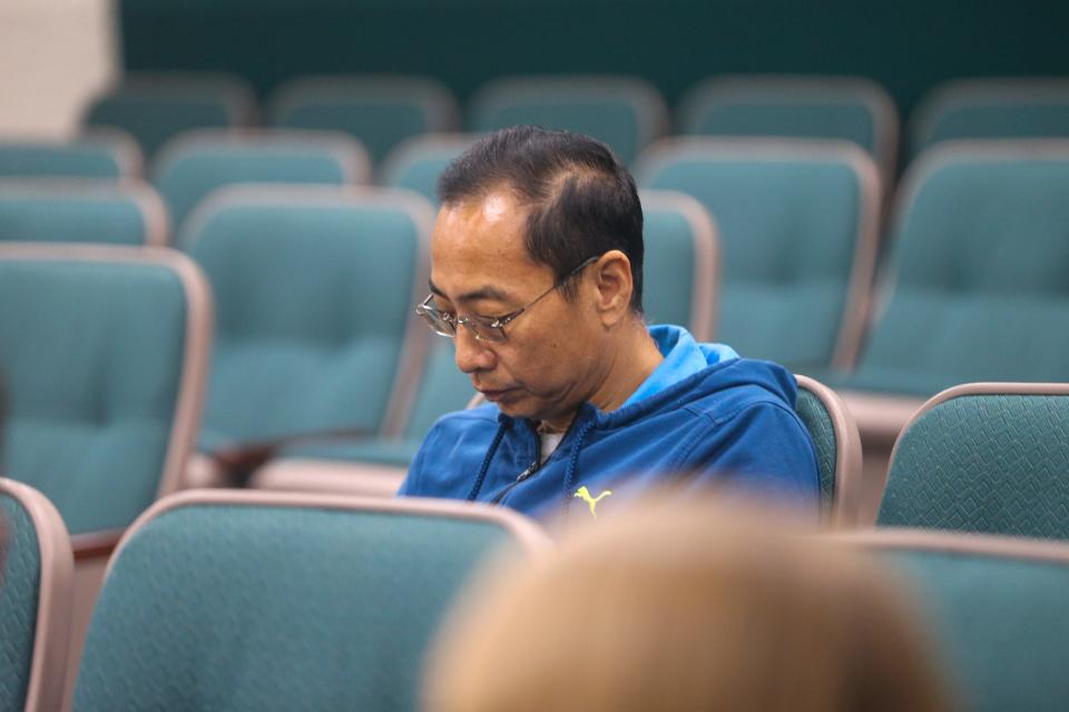 Lafayette-based landlord Chaofeng Liu waits as the City of Lafayette prepares to hold its Lafayette Hearing Authority meeting regarding two of Liu's properties, on Tuesday, Sept. 19, 2023, in Lafayette, Ind.