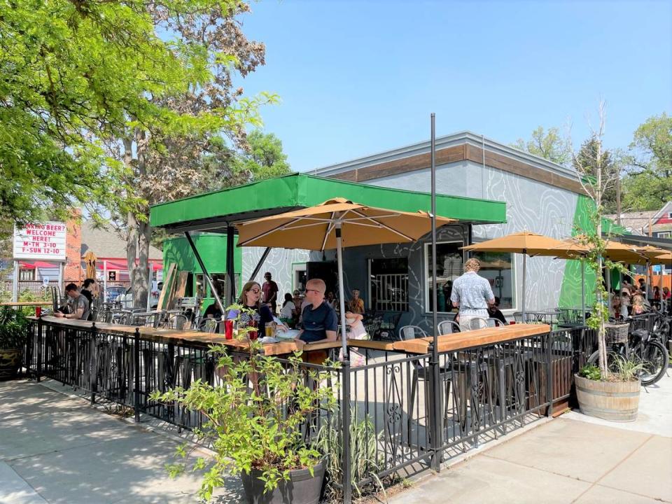 Patrons enjoy spring Boise weather Friday afternoon on the patio of Lost Grove Brewing in Hyde Park.