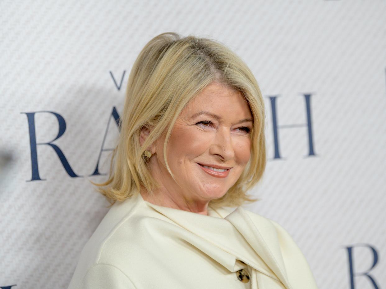 Martha Stewart smiling in a white top