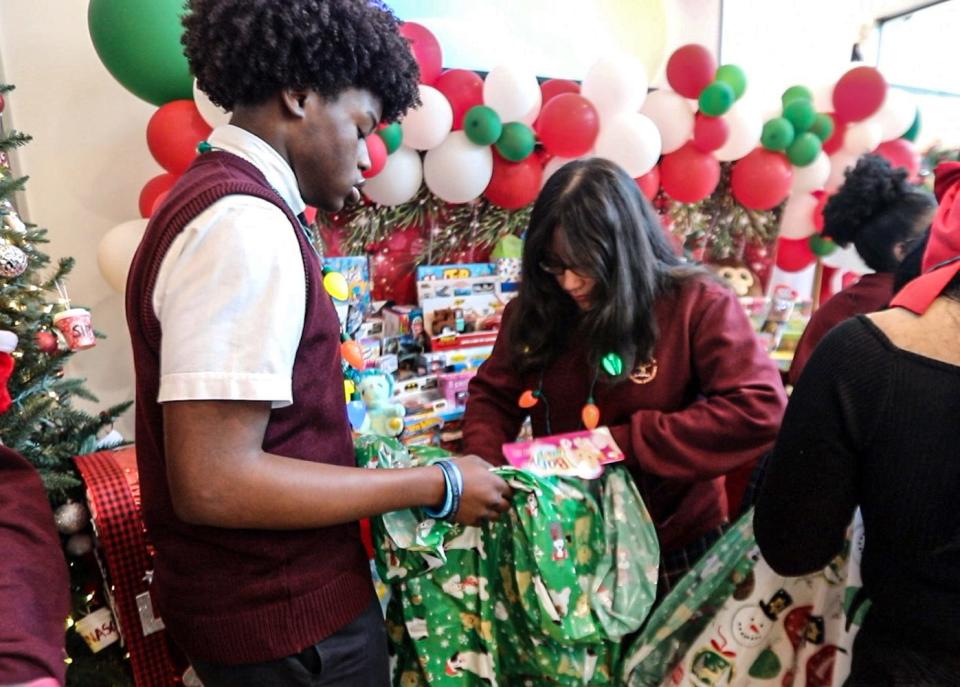 Students at the Charter School of Educational Excellence in Yonkers pack up donated toys as the culmination of a toy drive at the school Dec. 20. 2023. Members of the Helping Hands Club, an after school club, collected toys, dolls, and other holiday gifts to be delivered to Graham Wyndham, a Harlem based organization that provides foster care, adoption services, and other child welfare programs for children and families.