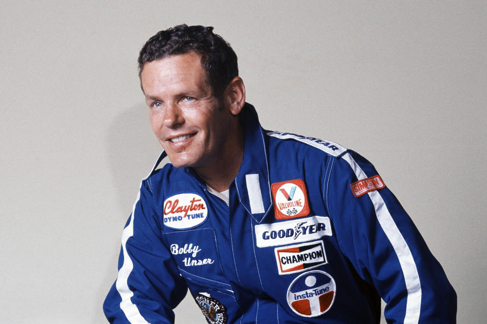 FILE - Race car driver Bobby Unser is shown in this 1977 file photo. Bobby Unser, a three-time Indianapolis 500 winner and part of the only pair of brothers to win “The Greatest Spectacle in Racing” has died. He was 87. He died Sunday, May 2, 2021, at his home in Albuquerque, New Mexico of natural causes, The Indianapolis Speedway said Monday. (AP Photo/File)