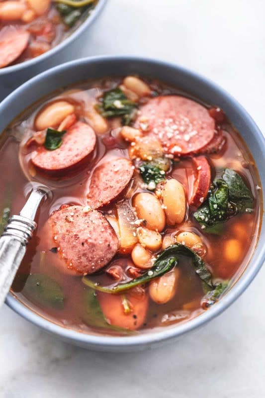 <p>Le Creme de La Crumb</p><p>Sausage and white bean soup is an easy and deliciously filling combination of cannellini beans, onions, garlic, roasted tomatoes, kielbasa, and lots of Italian herbs and spices that bring it all together.</p><p><strong>Get the recipe: <a href="https://www.lecremedelacrumb.com/sausage-and-white-bean-soup/" rel="nofollow noopener" target="_blank" data-ylk="slk:Sausage and White Bean Soup;elm:context_link;itc:0;sec:content-canvas" class="link "><em>Sausage and White Bean Soup</em></a></strong></p>