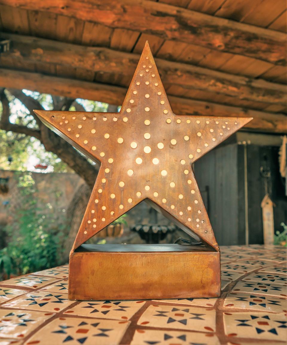 Commerative copper star casings with light bulbs from El Paso's Mountain on the Star are being sold by the El Paso Chamber to fund its $300,000 renovation of the landmark. The commemorative stars cost $1,000 apiece.