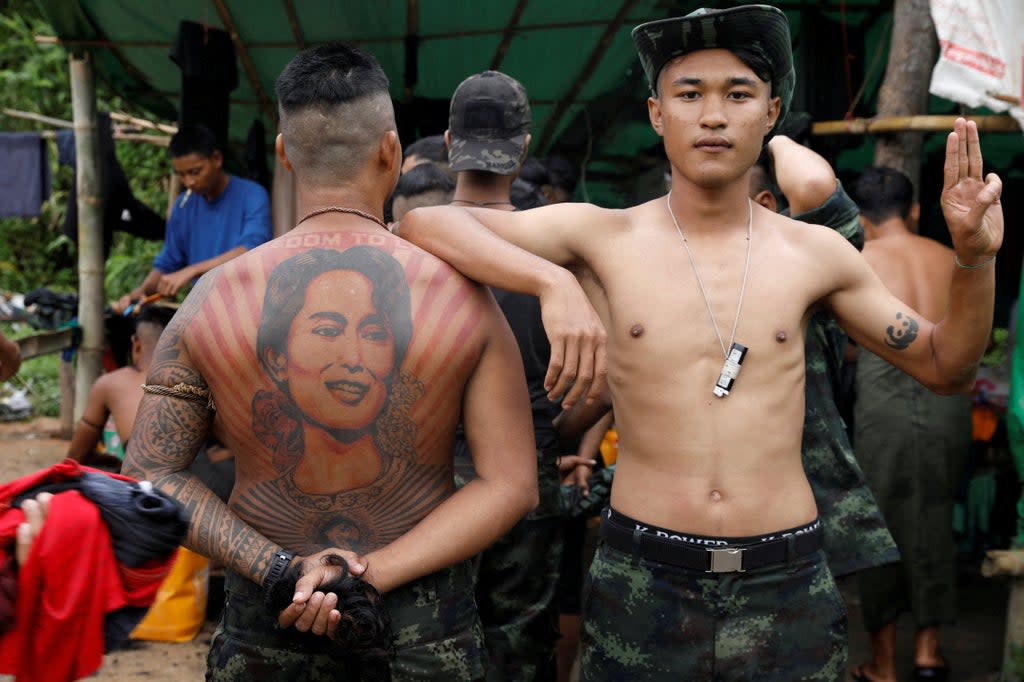 Members of the People’s Defence Force (PDF) stand at a training camp in an area controlled by ethnic Karen rebels, Karen State, Myanmar (Reuters)