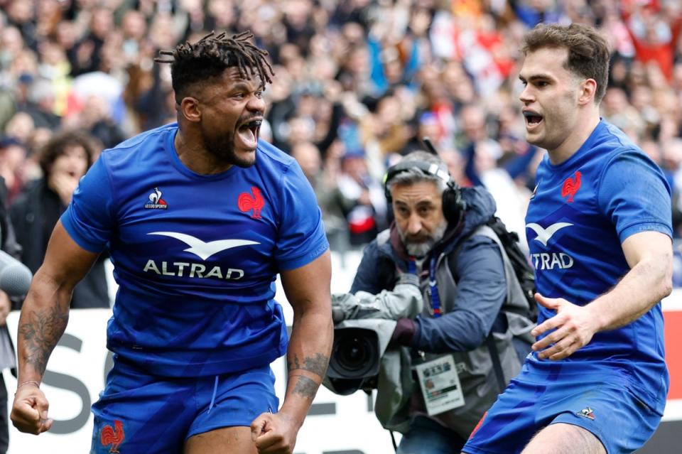 Triumphant: France ran in another six tries in a thrilling win over Wales in Paris on Super Saturday  (REUTERS)