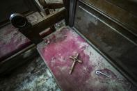 Damage following a bomb explosion at the Saint Peter and Saint Paul Coptic Orthodox Church in Cairo on December 11, 2016