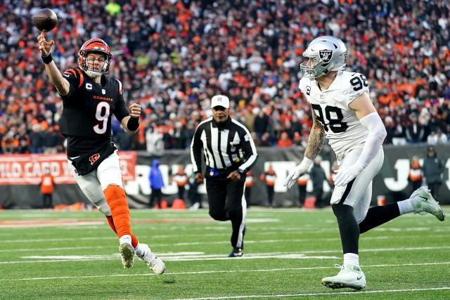 Cincinnati Bengals quarterback Joe Burrow (9) throws a pass against the  Chicago Bears during an NFL