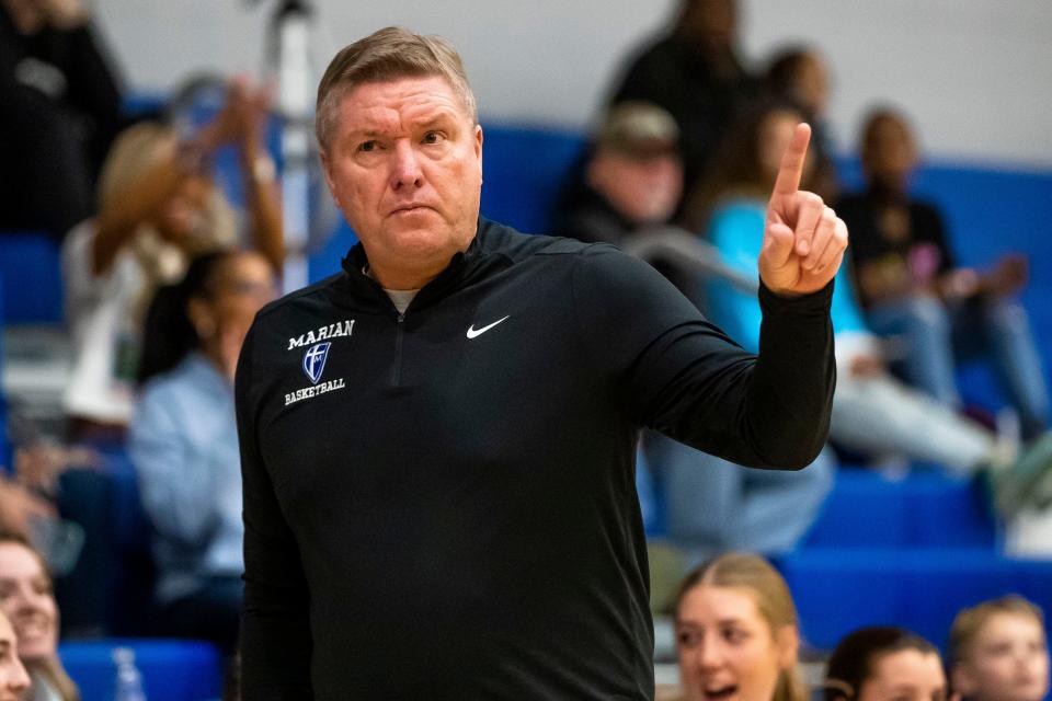 Marian head coach Steve Scott calls a play during the Marian vs. Saint Joseph girls sectional championship basketball game Saturday, Feb. 4, 2023 at Marian High School.