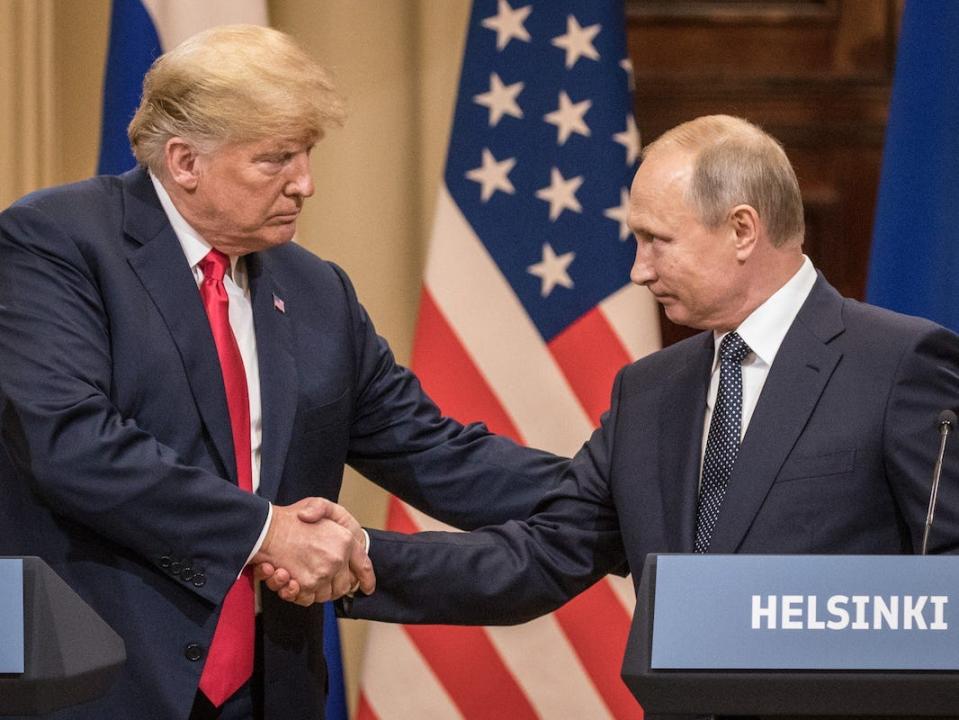 trump putin handshake