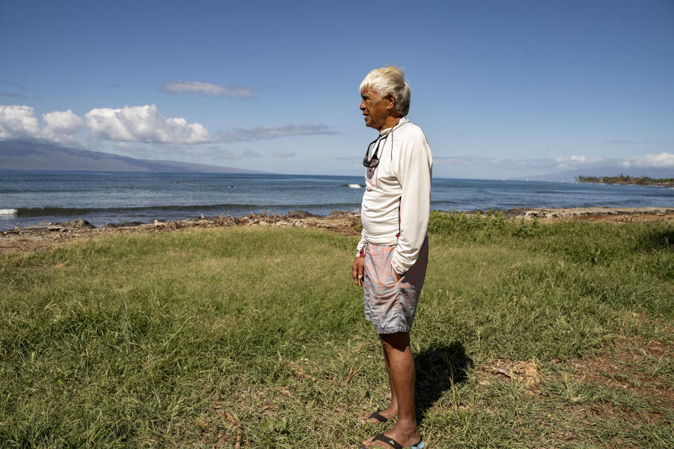 Abraham "Snake" Ah Hee, one of the first crew members of Hokulea - the Polynesian double-hulled voyaging canoe, looks at the ocean at Launiupoko Beach Park on Friday, Feb. 23, 2024, in Lahaina, Hawaii. (AP Photo/Mengshin Lin)