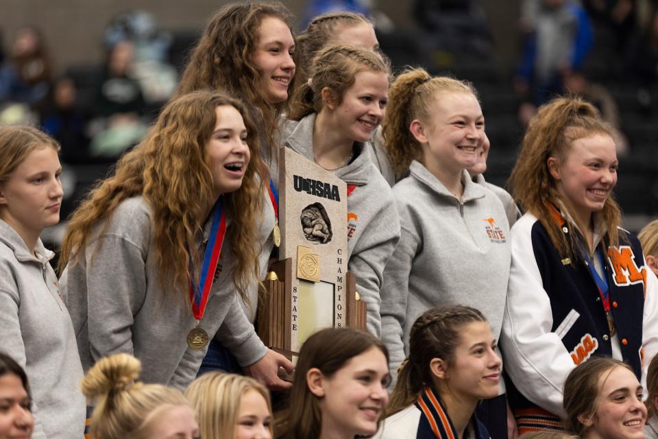 Mountain Crest High School celebrates a win during the 4A Girls Wrestling State Championships at the UCCU Center in Orem on Thursday, Feb. 15, 2024. | Marielle Scott, Deseret News