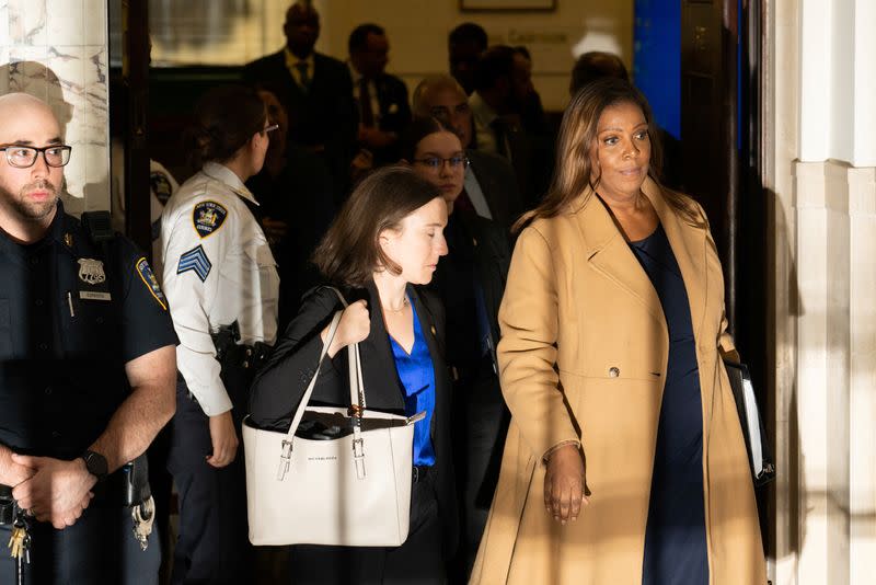 New York Attorney General Letitia James walks after exiting the courtroom in New York