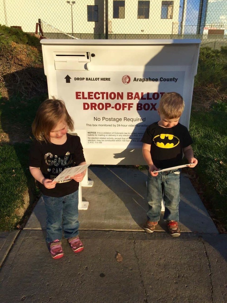 In Colorado, almost everyone is voting by mail-in ballot this year. I took our nearly 3-year-old twins with me to drop off my ballot so they could learn about our civic duty. We also happened to talk about how they were helping mommy make history by voting for the first female president. "Girls Can Be Anything" was my favorite book as a kid so I read it to them for the first time before dropping off our ballots. And made sure to dress Lydia in a Girls Can Do Anything shirt for the occasion.