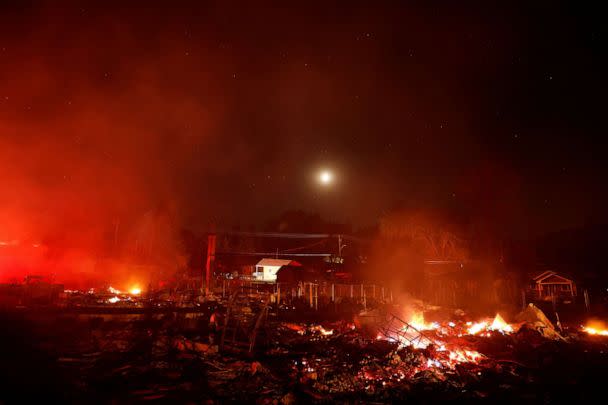 PHOTO: A general view of burnt and burning structures as the Mill Fire burns near Weed, Calif., Sept. 2, 2022. (Fred Greaves/Reuters)