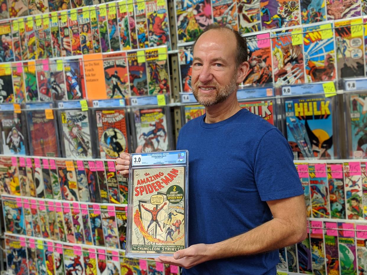 Chris Rupp, owner of Rupp's Comics, 335 N. Ohio Ave., poses with his newest "key book," "Amazing Spider-man #1."