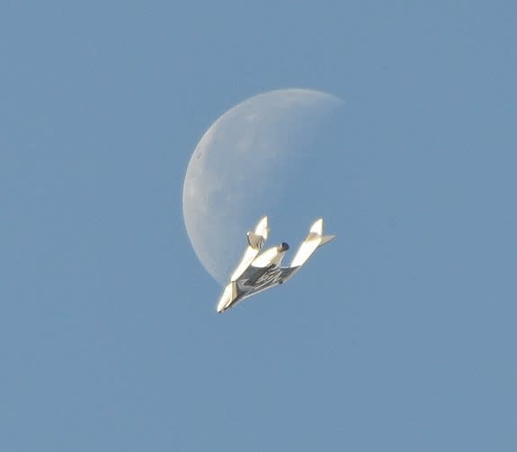SpaceShipTwo shoots the moon during April 3 test flight at Mojave Air and Space Port.