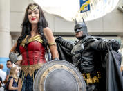 <p>Cosplayers dressed as Wonder Woman and Batman at Comic-Con International on July 18, 2018, in San Diego. (Photo: Christy Radecic/Invision/AP) </p>