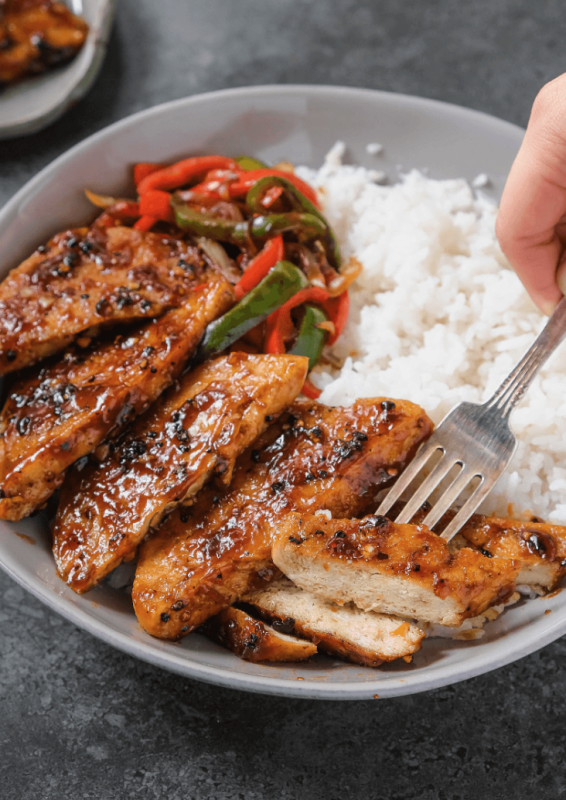<p>The Foodie Takes Flight</p><p>Really “meaty” vegan black pepper tofu steaks - tofu coated in a peppery, slightly sweet, and really savory sauce served over rice and a side of sautéed vegetables.</p><p><strong>Get the recipe: <a href="https://thefoodietakesflight.com/vegan-black-pepper-tofu-chicken-steaks/" rel="nofollow noopener" target="_blank" data-ylk="slk:Black Pepper Tofu Steaks;elm:context_link;itc:0;sec:content-canvas" class="link "><em>Black Pepper Tofu Steaks</em></a></strong></p>
