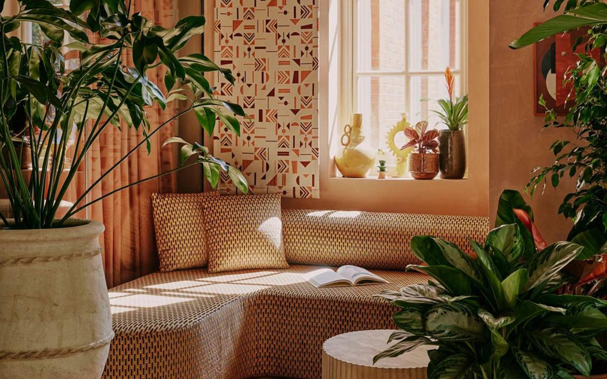  A living room with an abundance of pattern. 