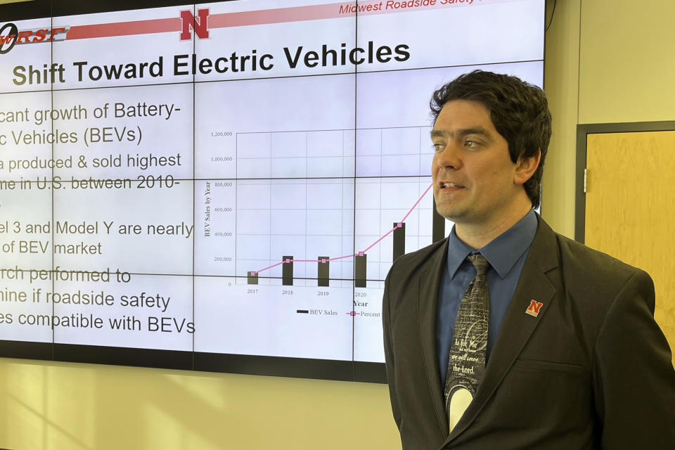 Engineer Cody Stolle, with the University of Nebraska's Midwest Roadside Safety Facility, discusses on Wednesday, Jan. 31, 2024, the potential affect heavier electric vehicles could have on the nation's roadside guardrail systems in Lincoln, Neb. Preliminary test crashes conducted last fall showed current guardrails did almost nothing to keep an electric Tesla sedan and a nearly 4-ton Rivian pickup truck from leaving the roadway at high speeds. (AP Photo/Margery Beck)