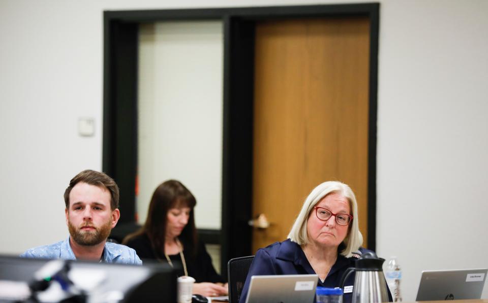 Springfield school board members Kelly Byrne and Judy Brunner at the Tuesday meeting. Tammi Harrington, the board secretary, is visible in the back.