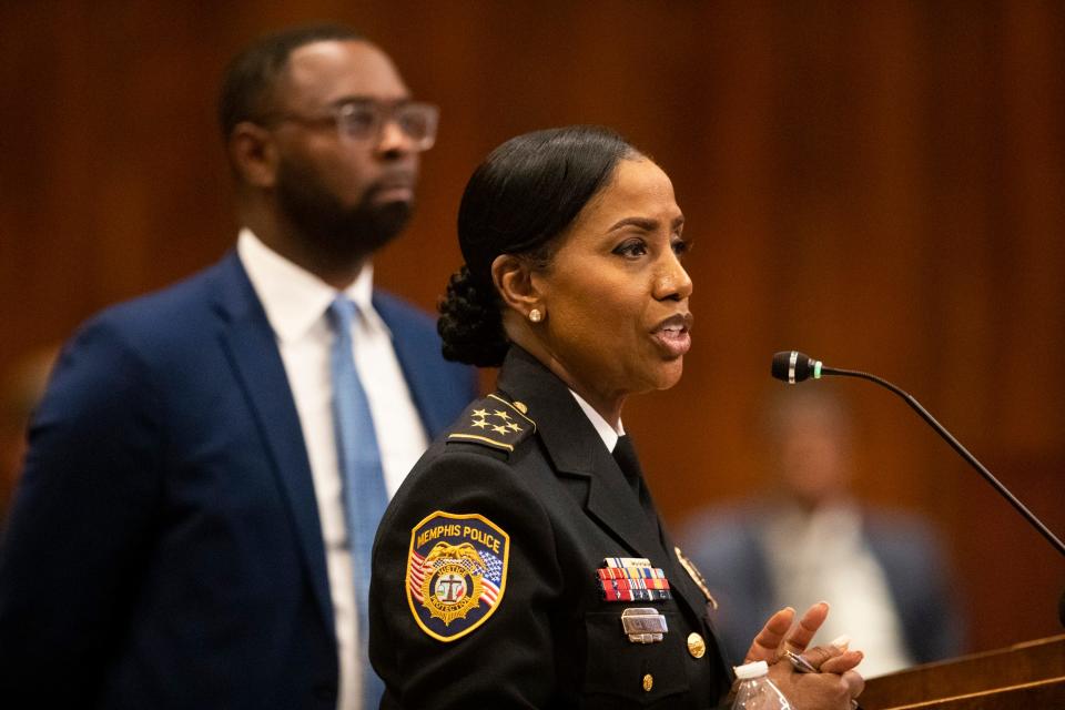 Memphis Police Chief Cerelyn “C.J.” Davis speaks to the city council as Mayor Paul Young stands behind her during her reappointment proceedings in the city council committee meeting at city hall in Memphis, Tenn., on Tuesday, January 9, 2024.