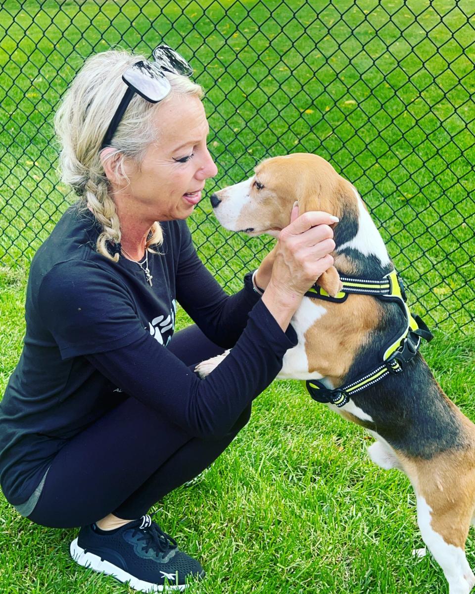 Executive Director of The Beagle Alliance Lori Cohen with Nik, a rescued beagle.