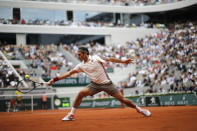 Switzerland's Roger Federer plays a shot against Germany's Oscar Otte during their second round match of the French Open tennis tournament at the Roland Garros stadium in Paris, Wednesday, May 29, 2019. (AP Photo/Christophe Ena )