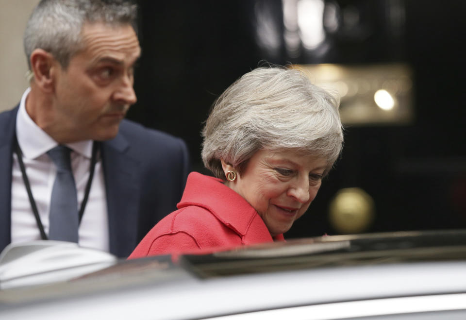 Britain's Prime Minister Theresa May leaves 10 Downing Street for the Houses of Parliament, in London, Thursday Nov. 15, 2018. Two British Cabinet ministers, including Brexit Secretary Dominic Raab, resigned Thursday in opposition to the divorce deal struck by Prime Minister Theresa May with the EU — a major blow to her authority and her ability to get the deal through Parliament. (AP Photo/Tim Ireland)