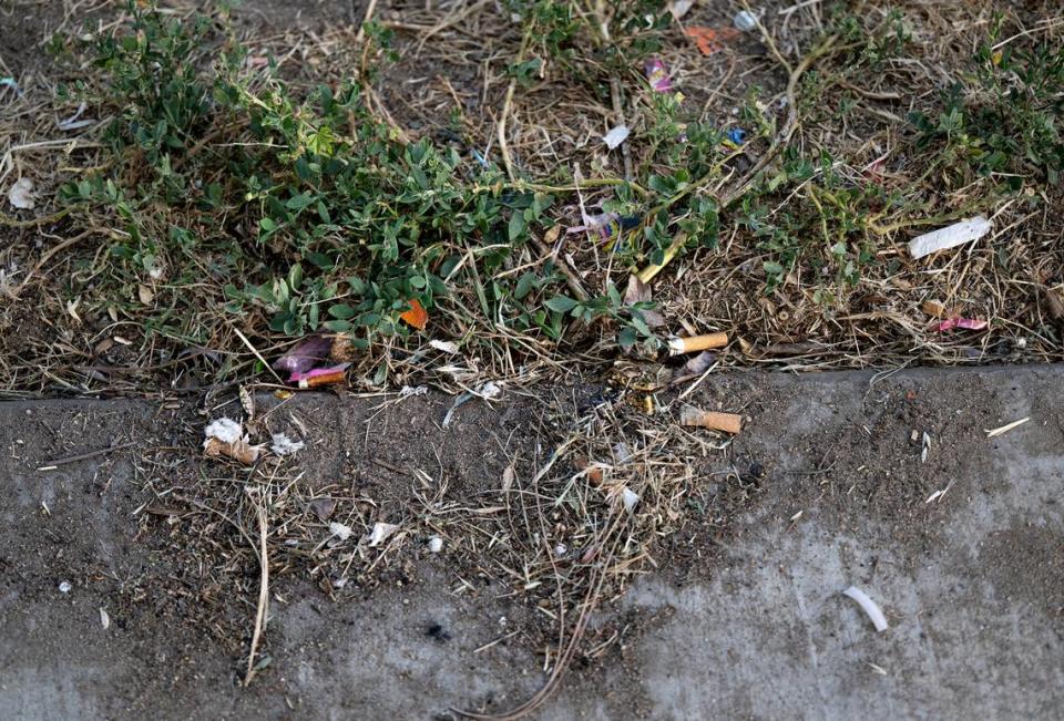 Cigarette butts and garbage can be found throughout Robertson Road Park in Modesto, Calif., Wednesday, May 31, 2023.