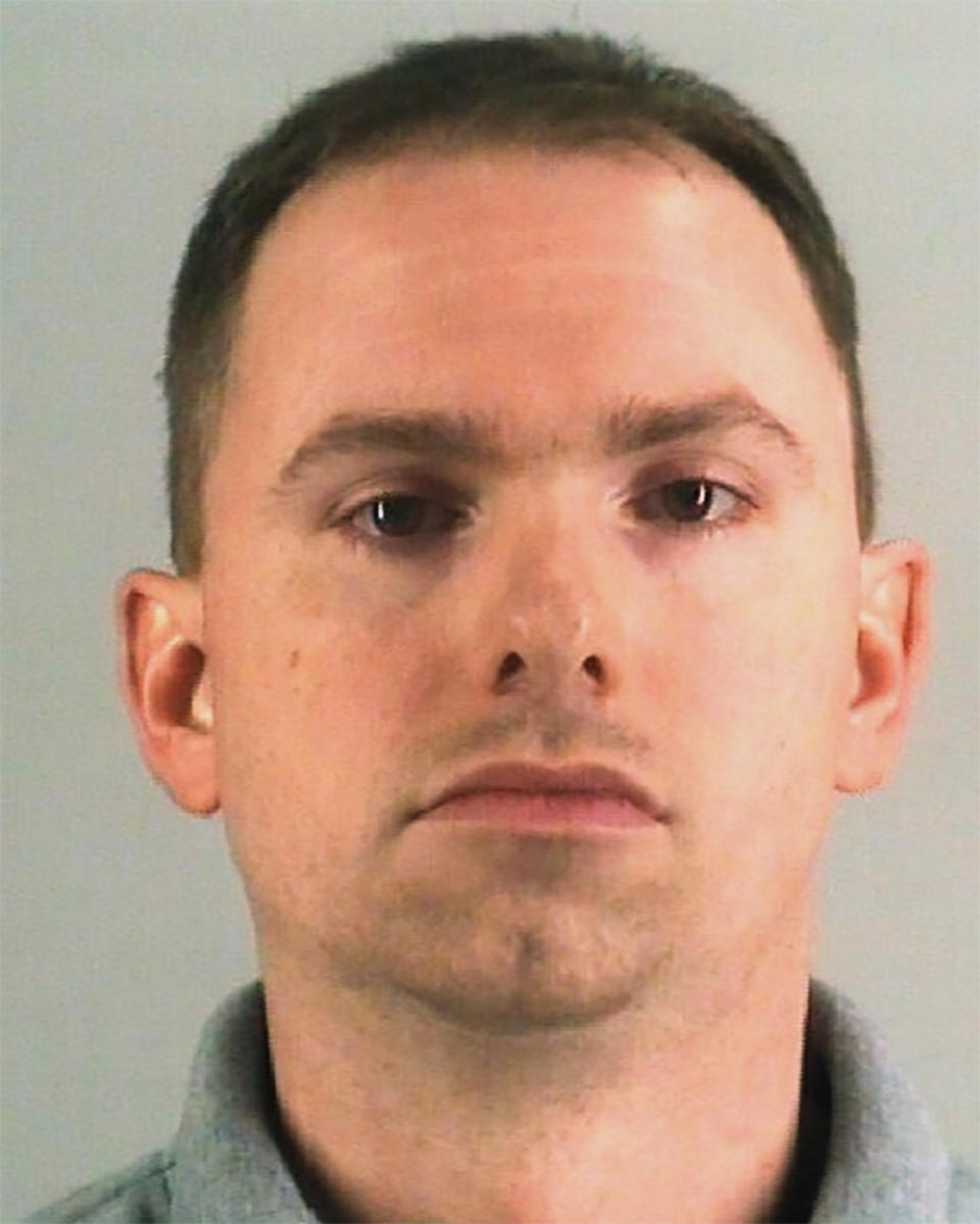 This undated photo provided by the Tarrant County Jail shows Aaron Dean. The Fort Worth police officer who shot and killed a black woman through a back window of her home while responding to a call about an open front door was charged with murder on Monday after resigning from the force. (Tarrant County Jail via AP)