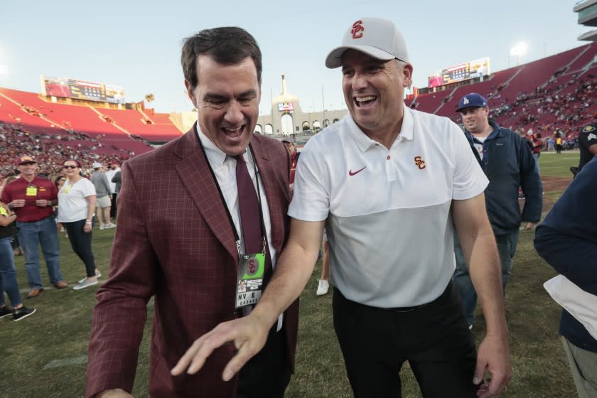 LOS ANGELES, CA, SATURDAY, NOVEMBER 23, 2019 - USC head coach Clay Helton and Athletic Director Mike Bohn.