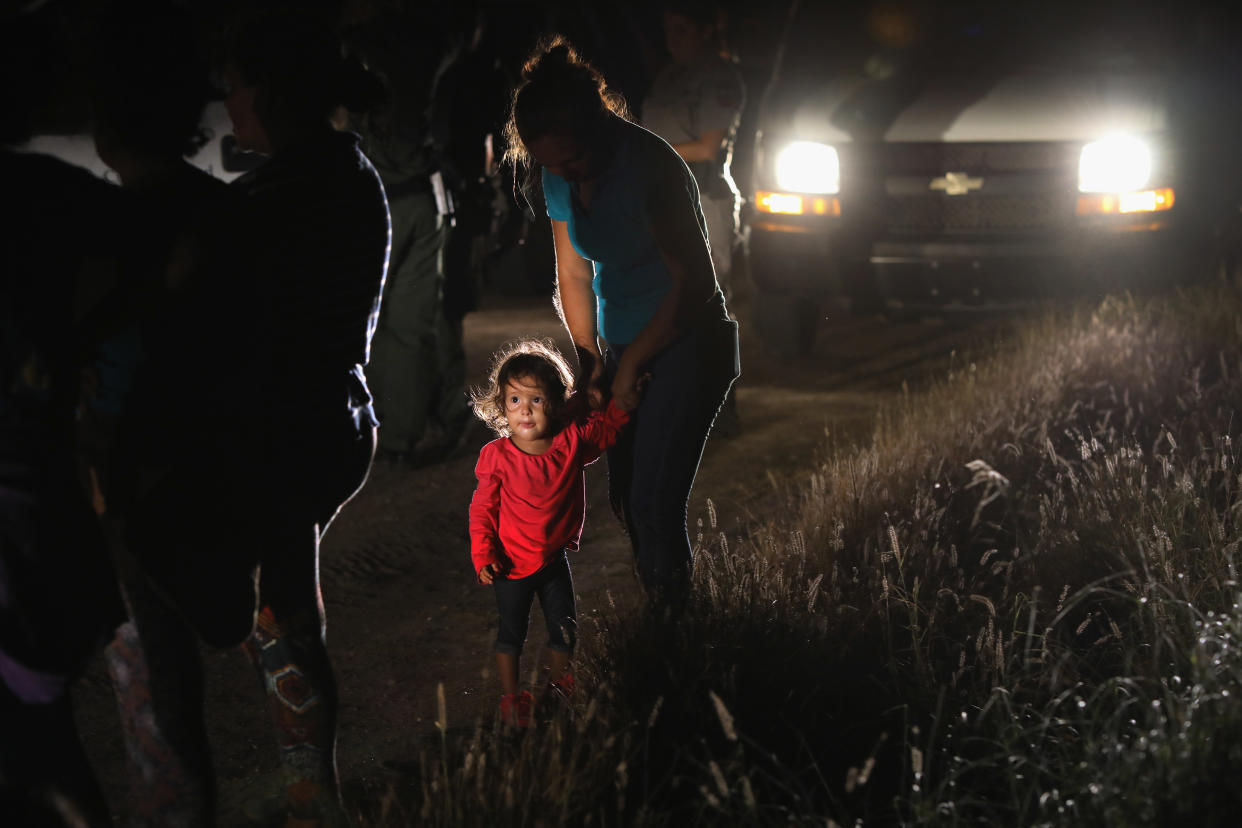 A 2-year-old Honduran girl with her mother after being detained by U.S. Border Patrol agents near McAllen, Texas, before possible separation under the Trump administration's&nbsp;"zero tolerance" immigration policy.&nbsp; (Photo: John Moore via Getty Images)