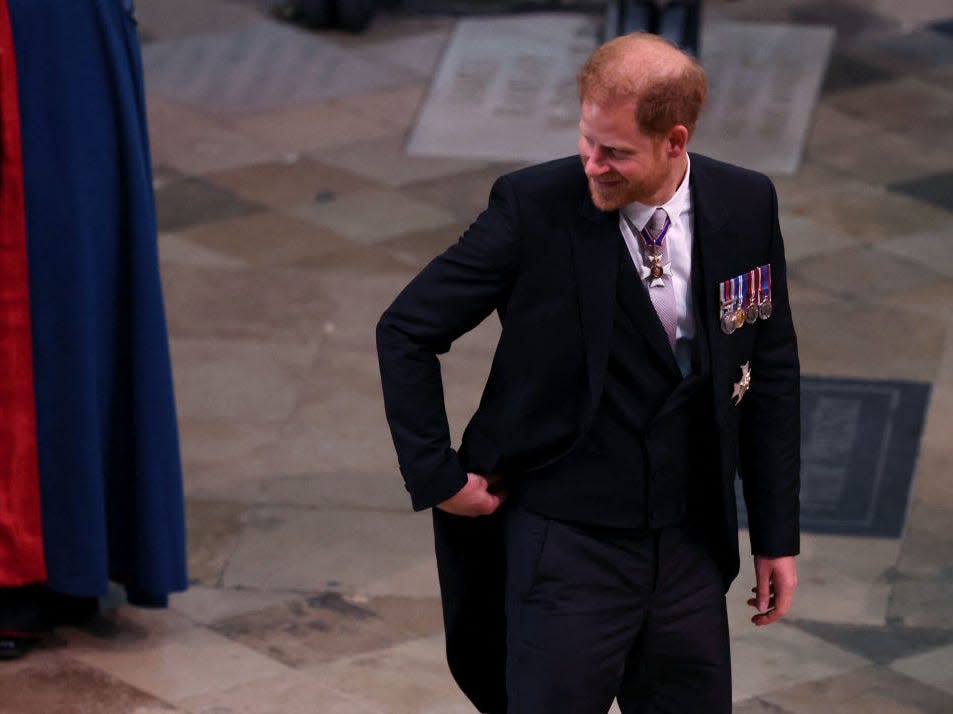 Prince Harry, Duke of Sussex arrives for the Coronation of King Charles III and Queen Camilla on May 6, 2023 in London, England. T