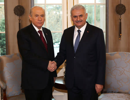 Turkish Prime Minister Binali Yildirim meets with opposition Nationalist Movement Party (MHP) leader Devlet Bahceli in Ankara, Turkey, December 1, 2016. Mustafa Aktas/Prime Minister's Press Office/Handout via REUTERS