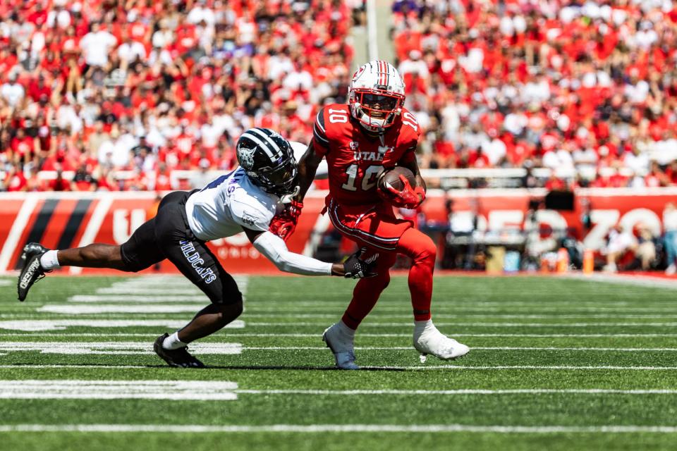 Utah Utes wide receiver Money Parks (10) breaks away from the Weber Wildcats to score a touchdown during the second quarter at Rice-Eccles Stadium in Salt Lake City on Saturday, Sept. 16, 2023.