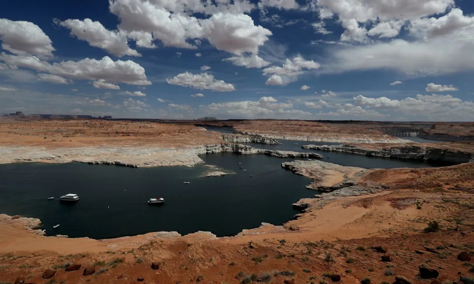 A lake surrounded by dry earth