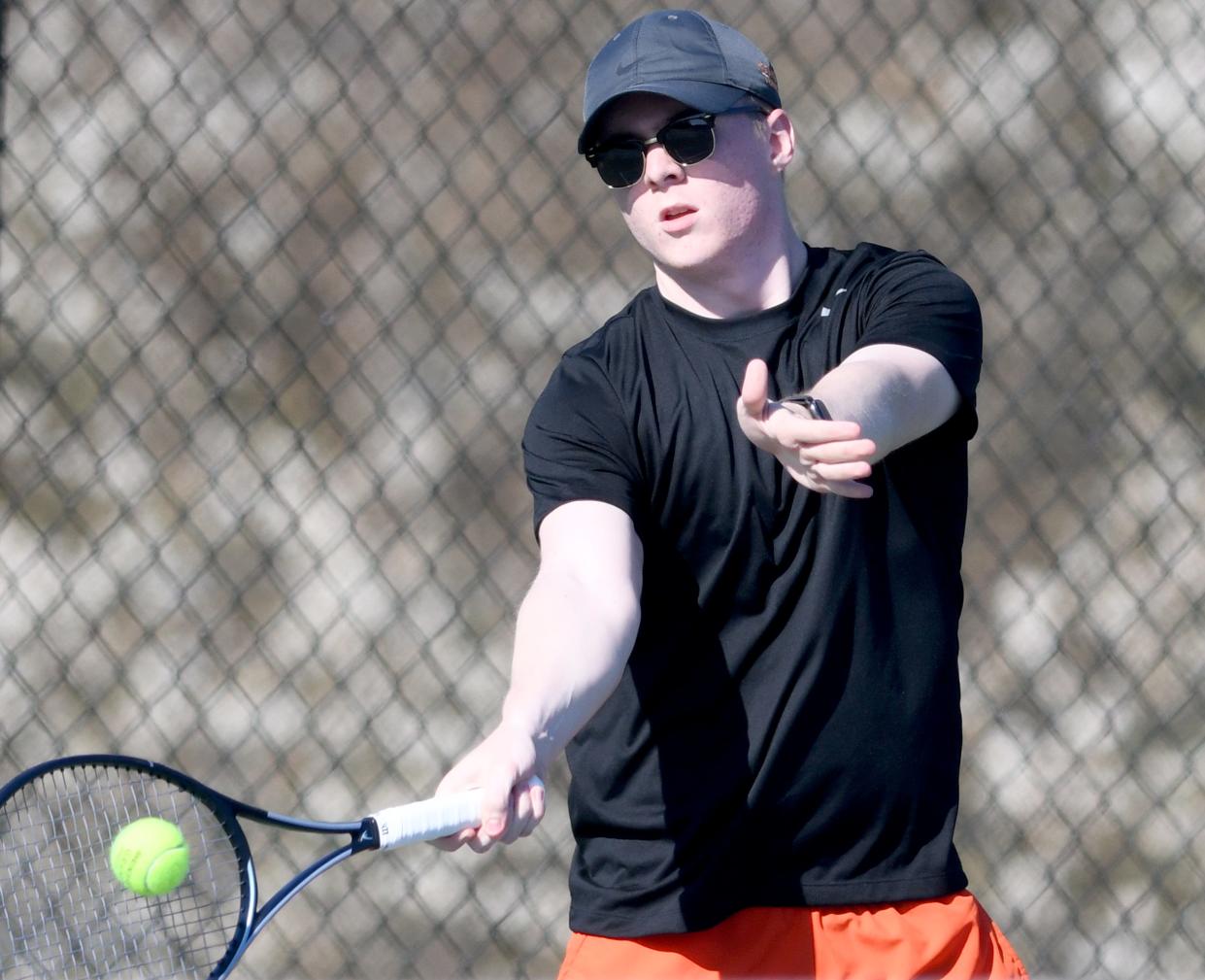 Hoover's Jackson Vance plays No. 2 singles against GlenOak's Jake Charles on Monday.