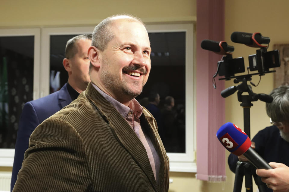 Marian Kotleba, chairman of the far-right People's Party Our Slovakia, smiles during a briefing at the party's election headquarters after general elections in Banska Bystrica, Slovakia, Sunday, March 1, 2020. Preliminary results from Saturday's parliamentary election show Slovakia's opposition with a comfortable lead. (Jan Kroslak/TASR via AP)