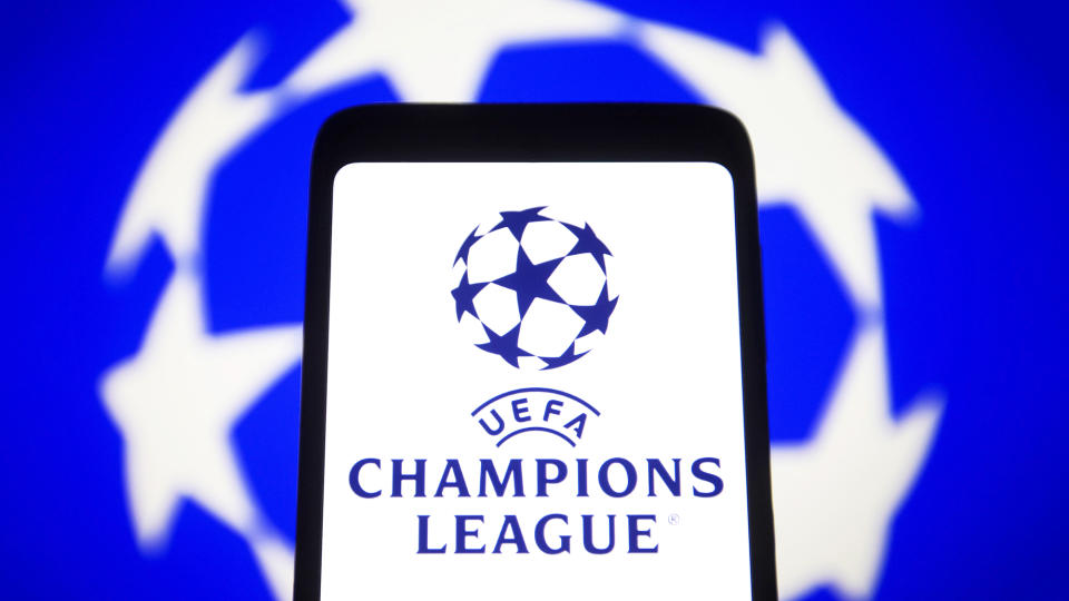  UEFA Champions League logo on a smartphone screen. 