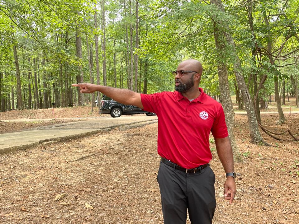 Standing near one of the crumbling camper pads at Roosevelt State Park, MDWFP parks division chief of staff Brian Ferguson talks about how much larger new pads will be once the agency renovates the park and others in the state.