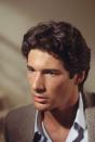 <p>As a young actor, Richard Gere had a thick mane of dark hair, which he sported in films like <em>American Gigolo </em>and <em>Officer and a Gentleman. </em></p>