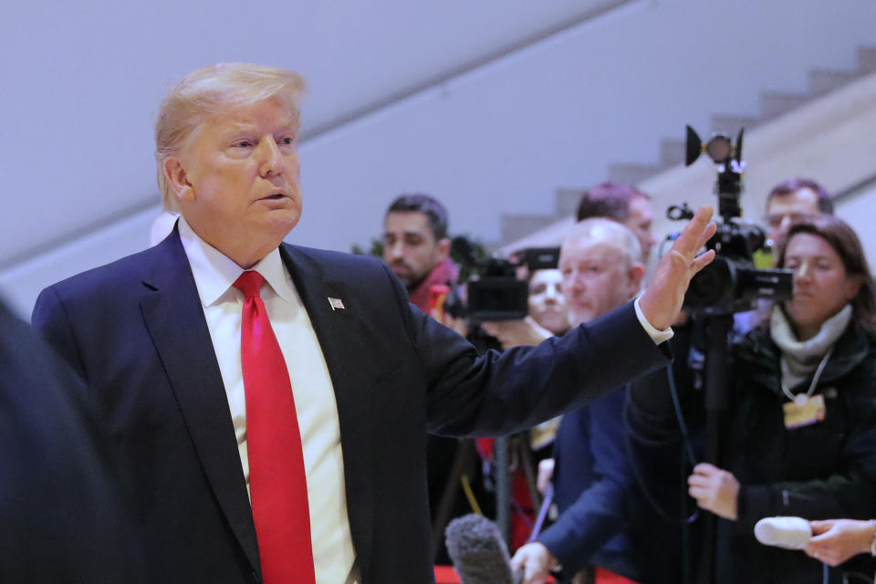 U.S. President Donald Trump leaves the World Economic Forum in Davos, Switzerland, Wednesday, Jan. 22, 2020. Trump's two-day stay in Davos is a test of his ability to balance anger over being impeached with a desire to project leadership on the world stage. (AP Photo/Markus Schreiber)