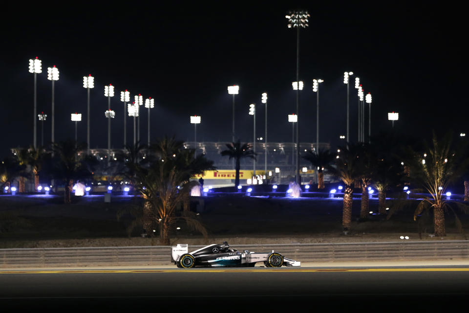 Mercedes driver Lewis Hamilton of Britain steers his car during the second free practice ahead of the Bahrain Formula One Grand Prix at the Formula One Bahrain International Circuit in Sakhir, Bahrain, Friday, April 4, 2014. (AP Photo/Hassan Ammar)