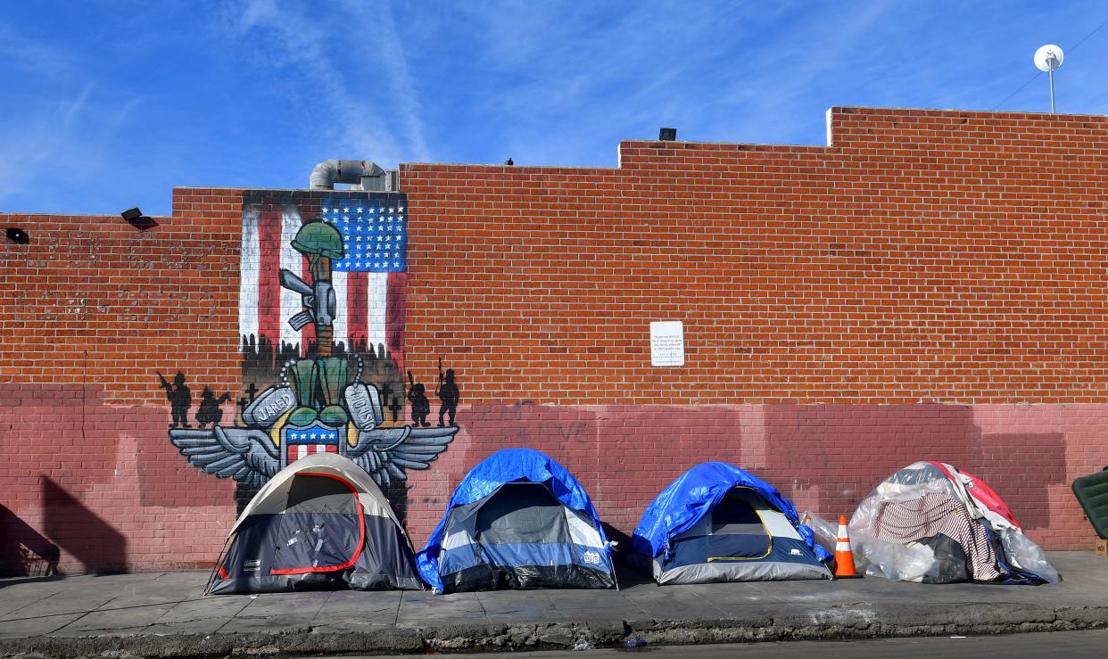 <p>LA mayor urged to rent 15,000 hotel rooms for homeless residents</p> (Photo by FREDERIC J. BROWN/AFP via Getty Images)