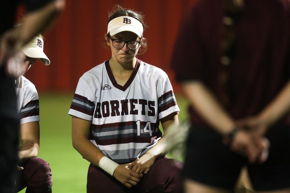 Flour Bluff's Sydney Salinas (14) fights back tears after a regional final game against Georgetown on Friday, May 27, 2022 at Jourdanton High School. The Eagles won 6-5.