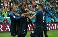 <p>Samuel Umtiti (no.5) celebrates after he put France into the lead against Belgium </p>