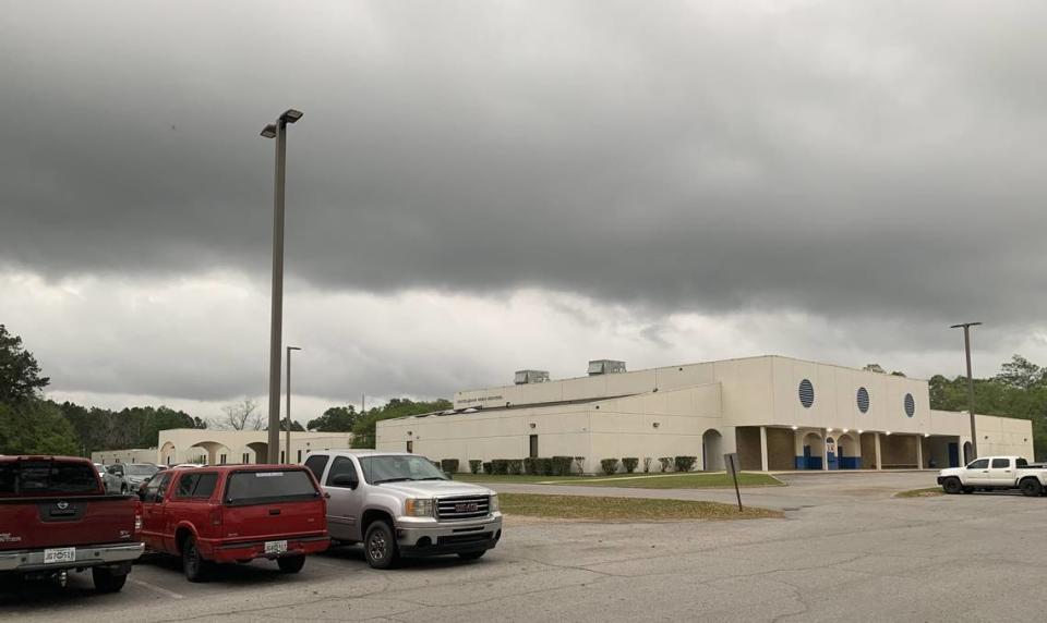 A blanket of dark clouds sits over Vancleave High School Wednesday morning. Jackson County is one of the Coast school districts that didn’t cancel classes because of the forecast for severe weather. The building has been used as a hurricane evacuation center, and students and teachers may be safer inside the school than at home if a hurricane spins over the town.